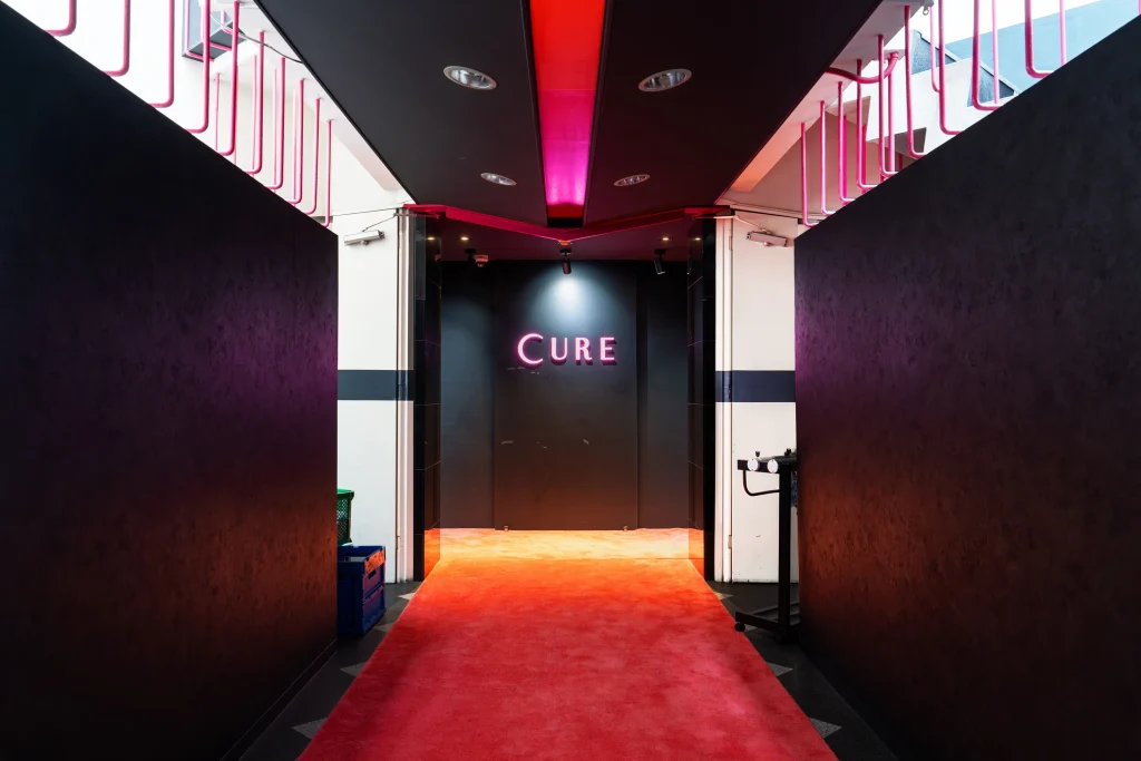 Red carpet entrance of Host Club Cure in Kabukicho Tokyo for first-time visitors